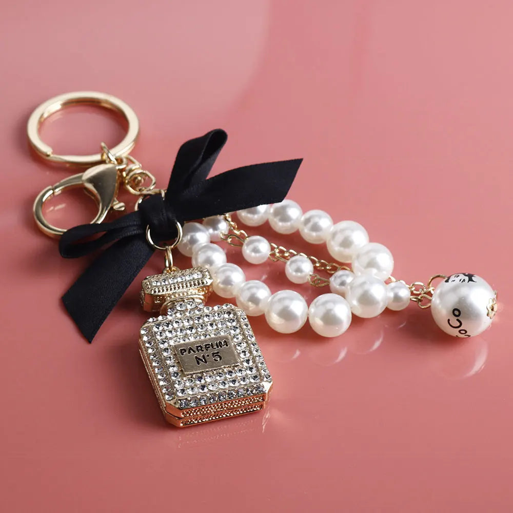Imitation Pearl Perfume Bottle Keychain – Cute Bow Bag Charm & Car Key Ring for Women